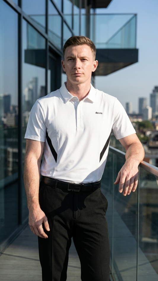 Golf polo with color-block paneling and a seamless laminated collar built for course to clubhouse comfort